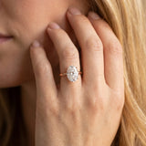 Rose gold Oval Solitaire Engagement Ring with Cathedral Band and Four-Prong Setting_17