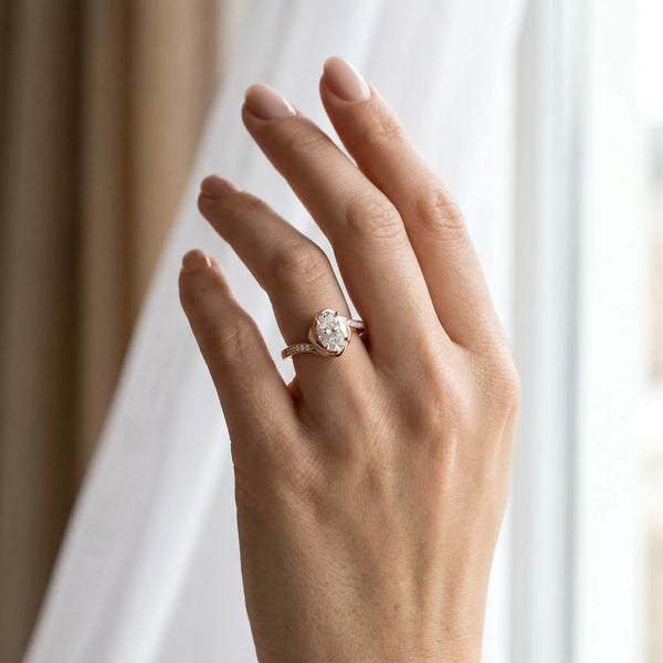 Rose gold Oval Solitaire Twist Band with Channel-Set Diamonds and Four-Prong Setting