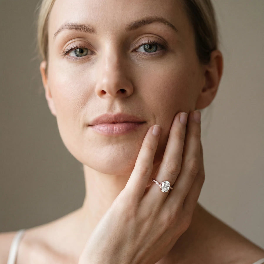 Rose gold Oval Solitaire Twist Band with Channel-Set Diamonds and Four-Prong Setting
