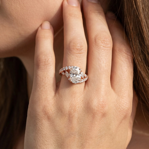 Rose gold Oval Solitaire with Pavé Twist Band and Four-Prong Setting