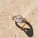 Rose gold Oval Solitaire with Pavé Twist Band and Four-Prong Setting_16