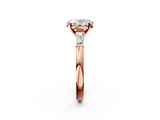 Rose gold Oval Solitaire with Tapered Baguette Side Stones on a Classic Band with Four-Prong Setting_132