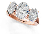 Rose gold Oval Three-Stone Diamond Ring with Prong Setting on a Classic Band_16