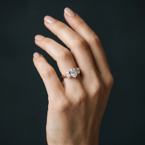 Rose gold Oval Three-Stone Diamond Ring with Solitaire Band and Four-Prong Setting