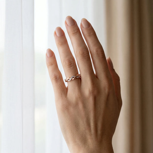 Rose gold Pavé Round Diamond Twist Eternity Band with Shared Prong Setting