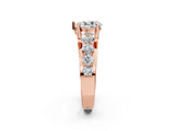 Rose gold Pear Brilliant Solitaire with Side Stones on a Pave Band and Four-Prong Setting_63