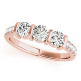 Rose gold Pear Brilliant Trilogy Channel Set Diamond Ring with Bar Prongs