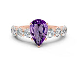 Rose gold Pear Cut Amethyst Prong Setting with Side Stones on a Pave Band