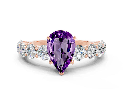 Rose gold Pear Cut Amethyst Prong Setting with Side Stones on a Pave Band