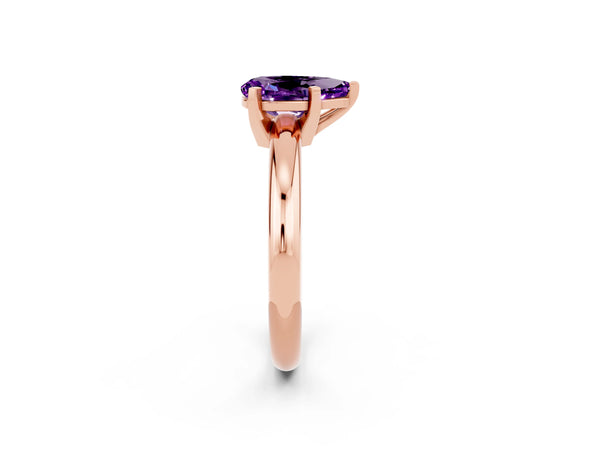 Rose gold Pear Cut Amethyst Solitaire Engagement Ring with Round Band and Four-Prong Setting