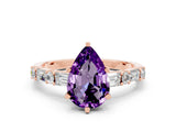 Rose gold Pear Cut Amethyst Solitaire with Side Baguettes and Channel Set Band