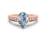 Rose gold Pear Cut Aquamarine Engagement Ring with Milgrain Channel Set Band and Prong Setting
