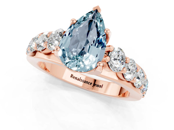 Rose gold Pear Cut Aquamarine Engagement Ring with Pavé Band and Four-Prong Setting