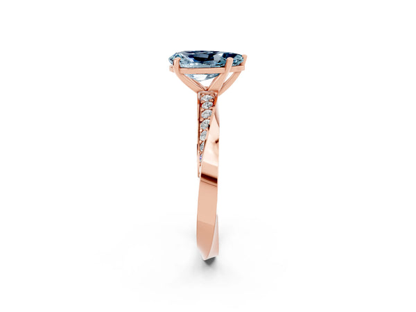 Rose gold Pear Cut Aquamarine Engagement Ring with Side Stone Accents and Four-Prong Setting