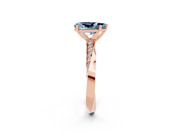 Rose gold Pear Cut Aquamarine Engagement Ring with Side Stone Accents and Four-Prong Setting