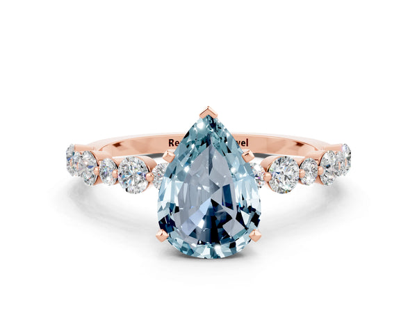Rose gold Pear Cut Aquamarine Prong Set Engagement Ring with Pavé Band