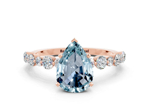 Rose gold Pear Cut Aquamarine Prong Set Engagement Ring with Pavé Band