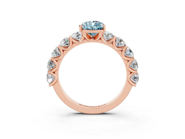 Rose gold Pear Cut Aquamarine Prong Setting with Side Stones on a Pave Band