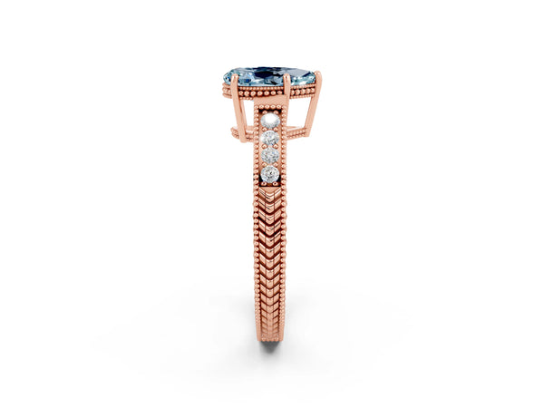 Rose gold Pear Cut Aquamarine Ring with Milgrain Pavé Band and Four-Prong Setting