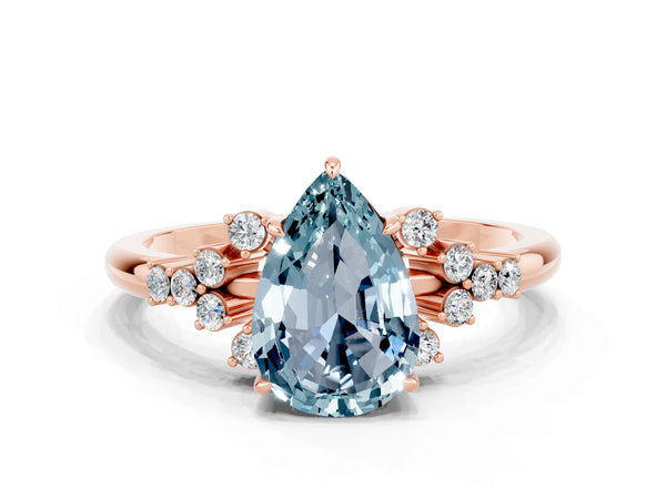 Rose gold Pear Cut Aquamarine Ring with Side Stones and Four-Prong Setting