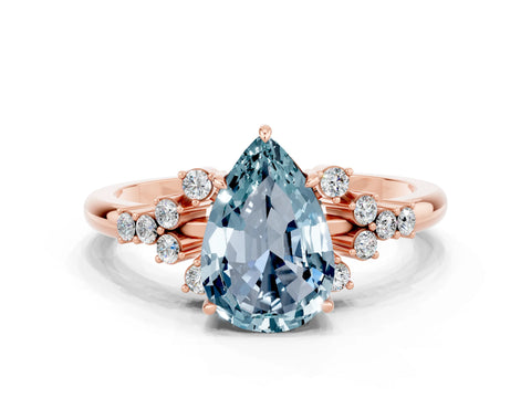 Rose gold Pear Cut Aquamarine Ring with Side Stones and Four-Prong Setting_36