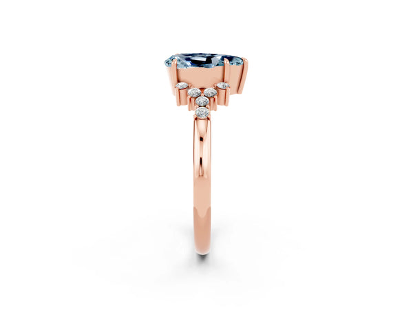 Rose gold Pear Cut Aquamarine Ring with Side Stones and Four-Prong Setting
