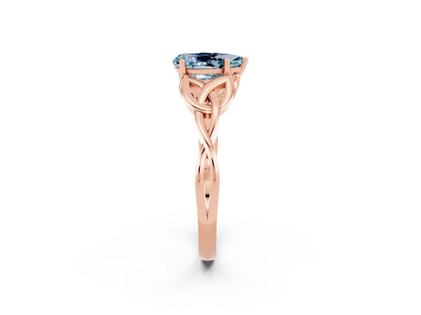 Rose gold Pear Cut Aquamarine Solitaire Celtic Knot Ring with Four-Prong Setting