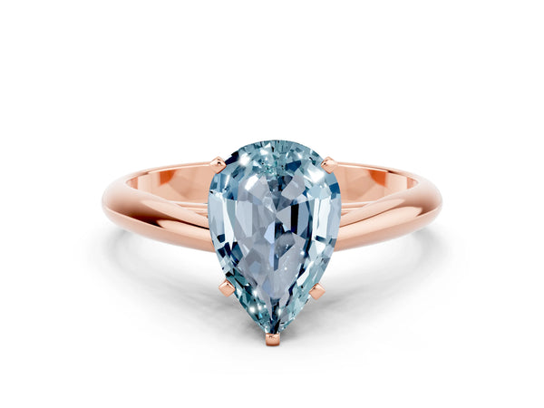 Rose gold Pear Cut Aquamarine Solitaire Engagement Ring with Cathedral Setting and Four-Prong Mount