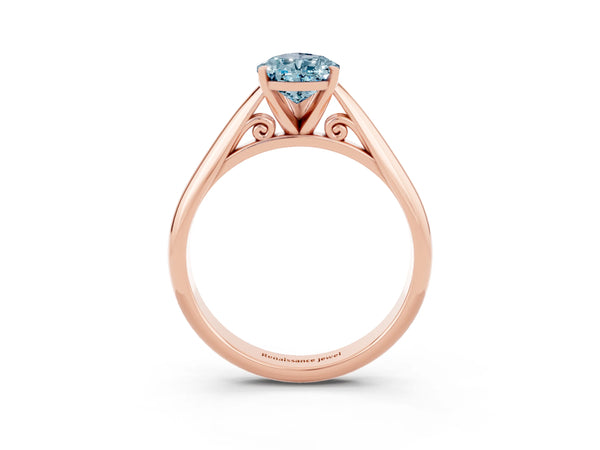 Rose gold Pear Cut Aquamarine Solitaire Engagement Ring with Cathedral Setting and Four-Prong Mount