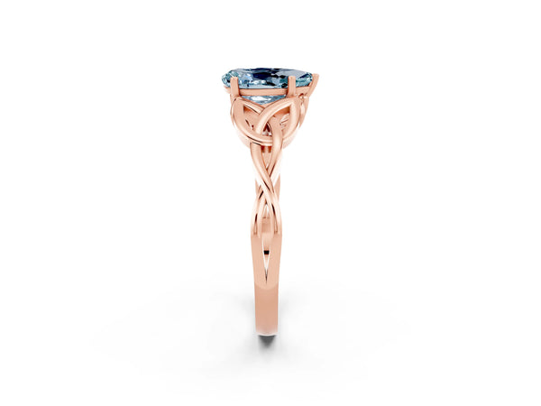 Rose gold Pear Cut Aquamarine Solitaire Engagement Ring with Celtic Knot Band and Four-Prong Setting