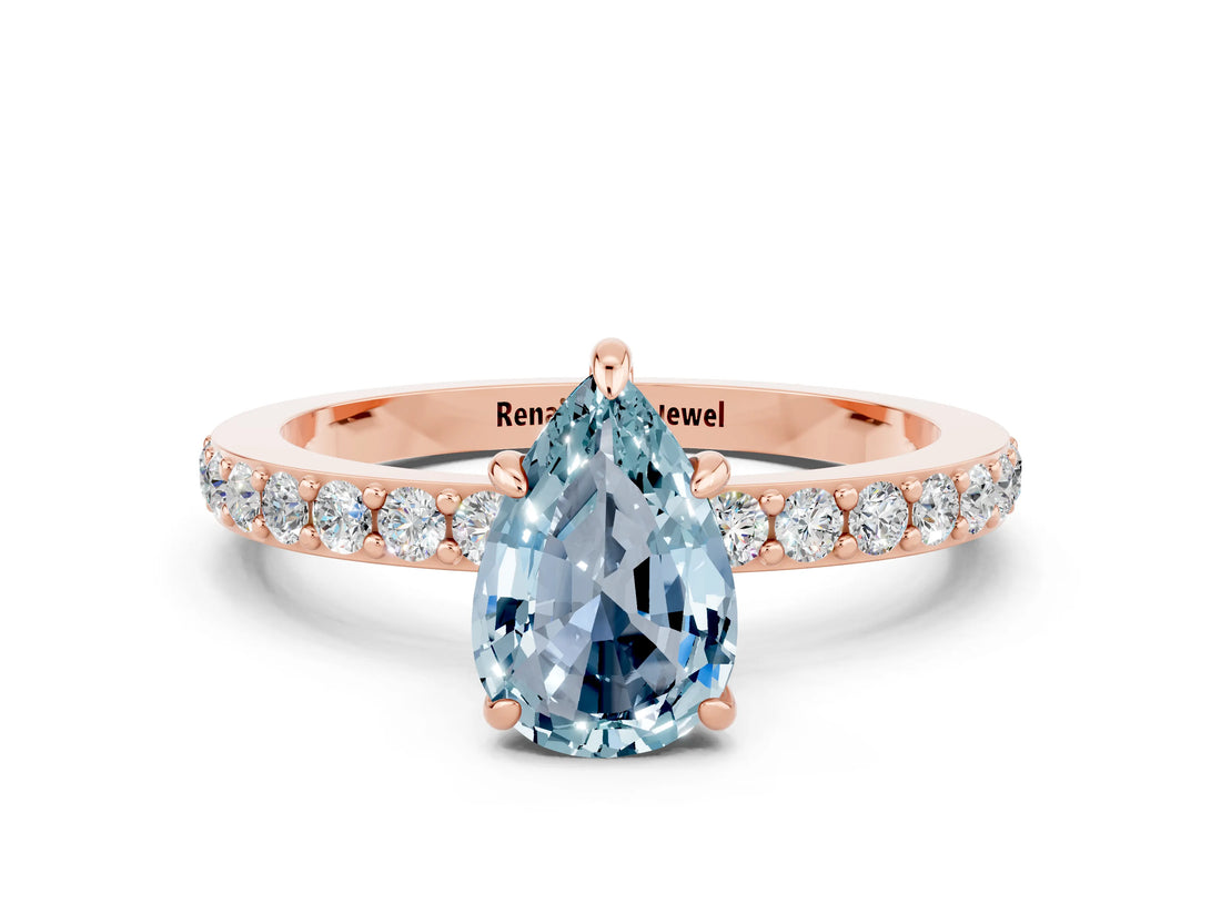 Rose gold Pear Cut Aquamarine Solitaire Engagement Ring with Pavé Band and Four-Prong Setting