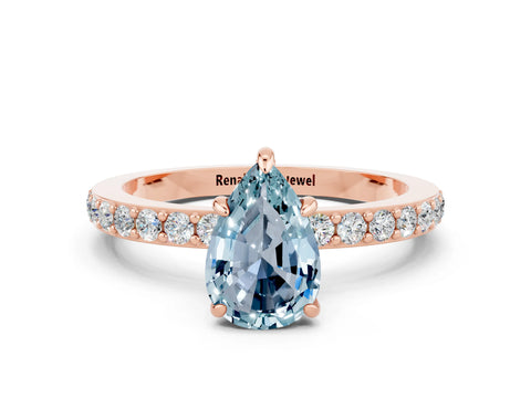 Rose gold Pear Cut Aquamarine Solitaire Engagement Ring with Pavé Band and Four-Prong Setting