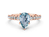Rose gold Pear Cut Aquamarine Solitaire Pavé Engagement Ring with Round Band and Prong Setting_78
