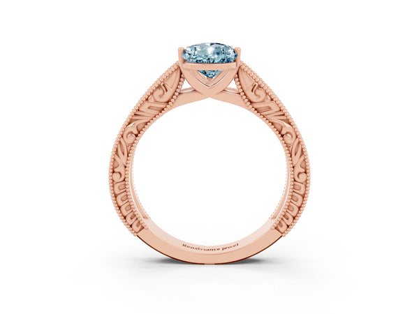 Rose gold Pear Cut Aquamarine Solitaire Ring with Engraved Band and Four-Prong Setting