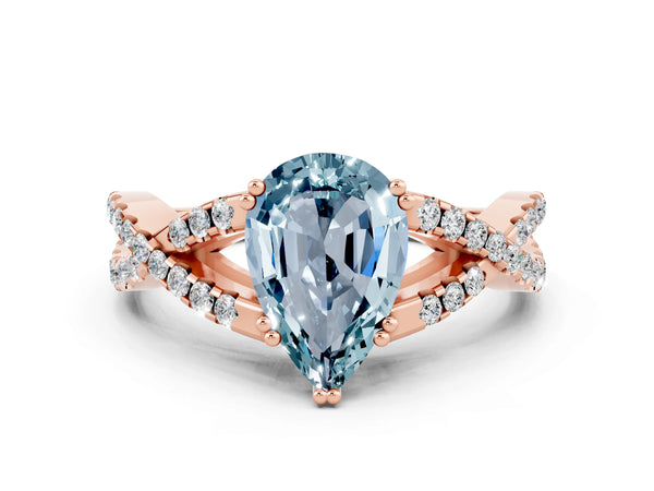 Rose gold Pear Cut Aquamarine Solitaire Ring with Four-Prong Setting and Twisted Pavé Band