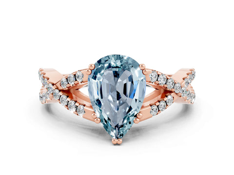 Rose gold Pear Cut Aquamarine Solitaire Ring with Four-Prong Setting and Twisted Pavé Band