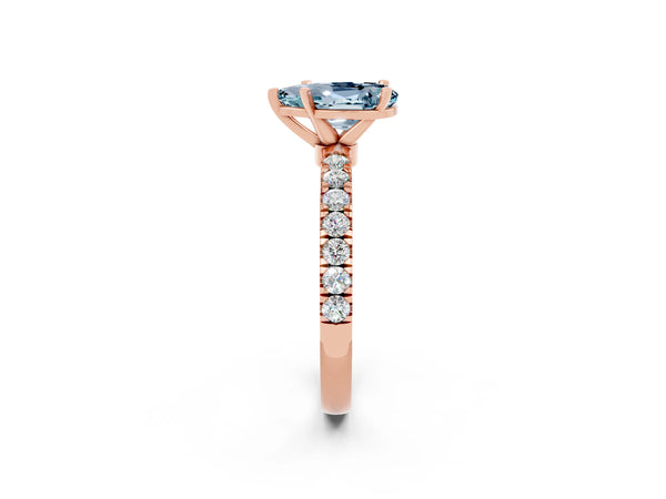 Rose gold Pear Cut Aquamarine Solitaire Ring with Pavé Accents and Four-Prong Setting