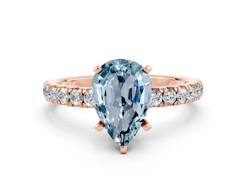 Rose gold Pear Cut Aquamarine Solitaire Ring with Pavé Accents and Four-Prong Setting
