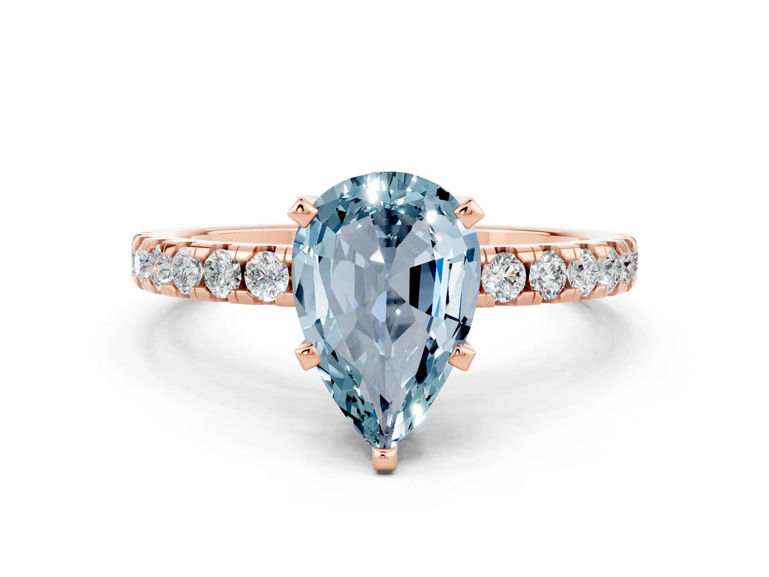 Rose gold Pear Cut Aquamarine Solitaire Ring with Pavé Band and Four-Prong Setting_24