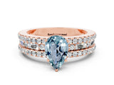 Rose gold Pear Cut Aquamarine Solitaire Ring with Pavé and Channel Set Band
