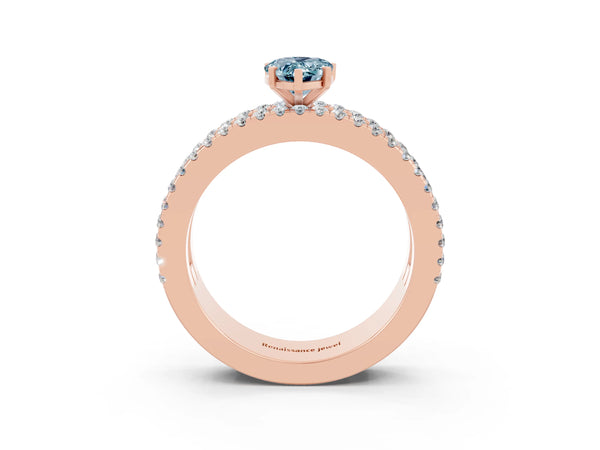 Rose gold Pear Cut Aquamarine Solitaire Ring with Pavé and Channel Set Band