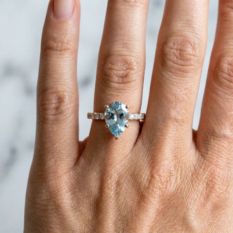 Rose gold Pear Cut Aquamarine Solitaire Ring with Round  Pavé Band and Four-Prong Setting_42