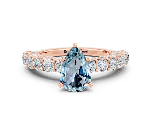 Rose gold Pear Cut Aquamarine Solitaire Ring with Shared Prong Pavé Band and Four-Prong Setting
