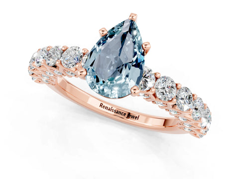 Rose gold Pear Cut Aquamarine Solitaire Ring with Shared Prong Pavé Band and Four-Prong Setting_1