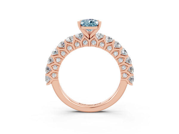 Rose gold Pear Cut Aquamarine Solitaire Ring with Shared Prong Pavé Band and Four-Prong Setting