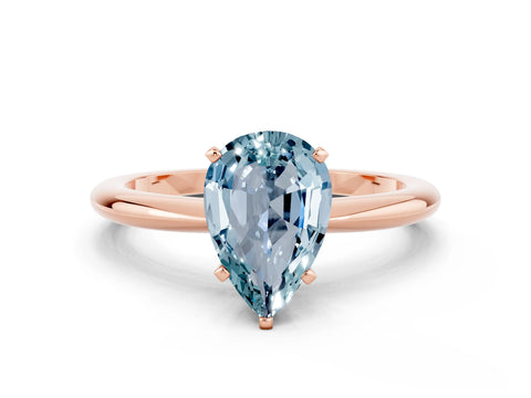 Rose gold Pear Cut Aquamarine Solitaire Ring with Six-Prong Setting and Classic Band