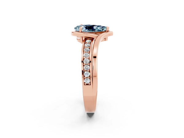 Rose gold Pear Cut Aquamarine Solitaire Ring with Split Shank and Prong Setting