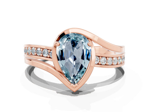 Rose gold Pear Cut Aquamarine Solitaire Ring with Split Shank and Prong Setting