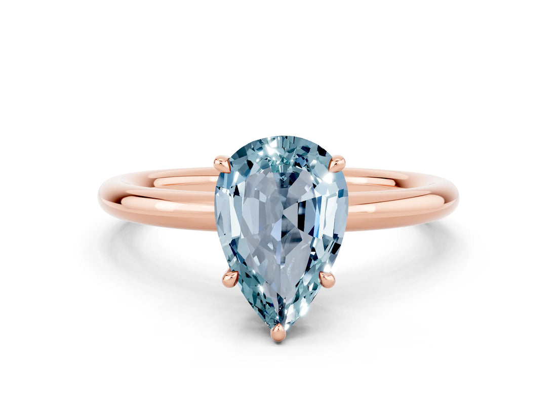 Rose gold Pear Cut Aquamarine Solitaire Ring with Thin Band and Four-Prong Setting_12