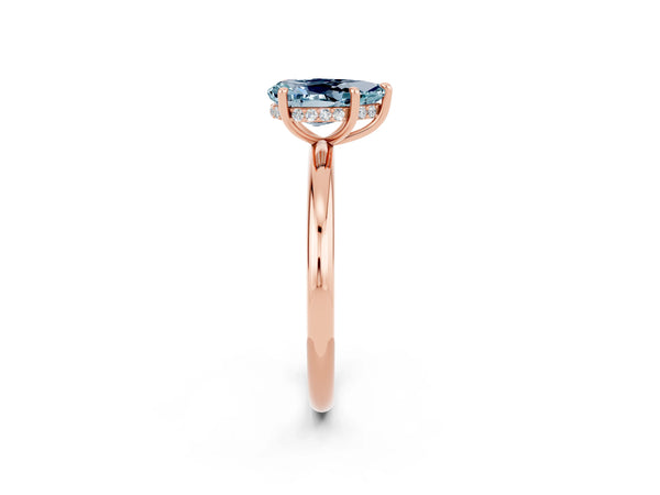 Rose gold Pear Cut Aquamarine Solitaire Ring with Thin Band and Four-Prong Setting